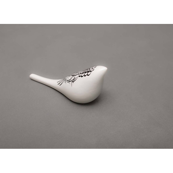 Ceramic bird with gold luster calligraphy