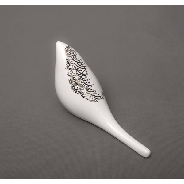 Ceramic bird with gold luster calligraphy